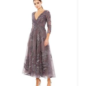 Women dress for wedding, ceremonies, and parties.
MAC-Duggal brand 
Size 10